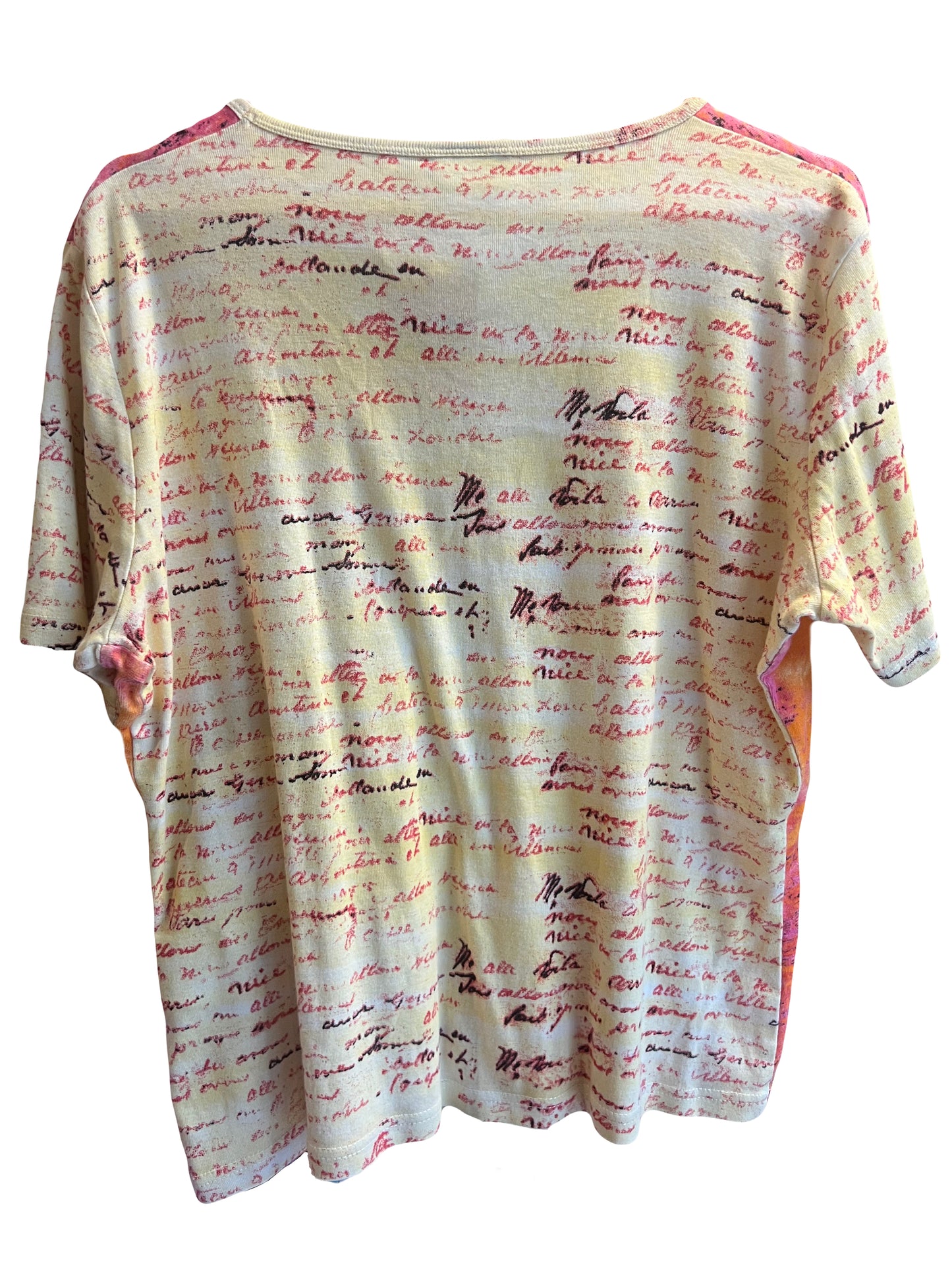tee shirt à motis et strass, de couleur beige rose et orange. A retrouver à la friperie Canaille Vintage à Bordeaux.
