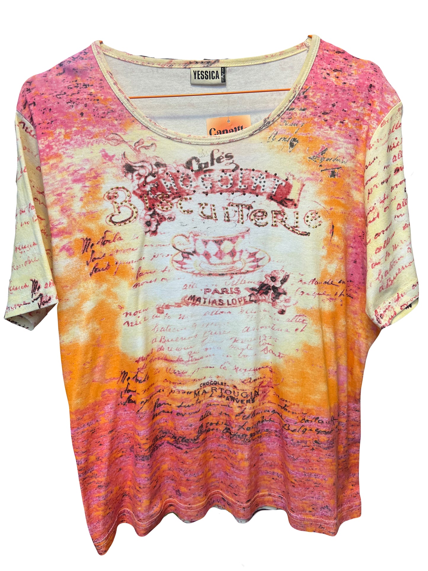 tee shirt à motis et strass, de couleur beige rose et orange. A retrouver à la friperie Canaille Vintage à Bordeaux.