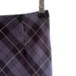 Jupe à carreaux tartan violet foncé / noir à retrouver sur notre boutique en ligne Canaille Vintage ou dans notre friperie à Bordeaux centre