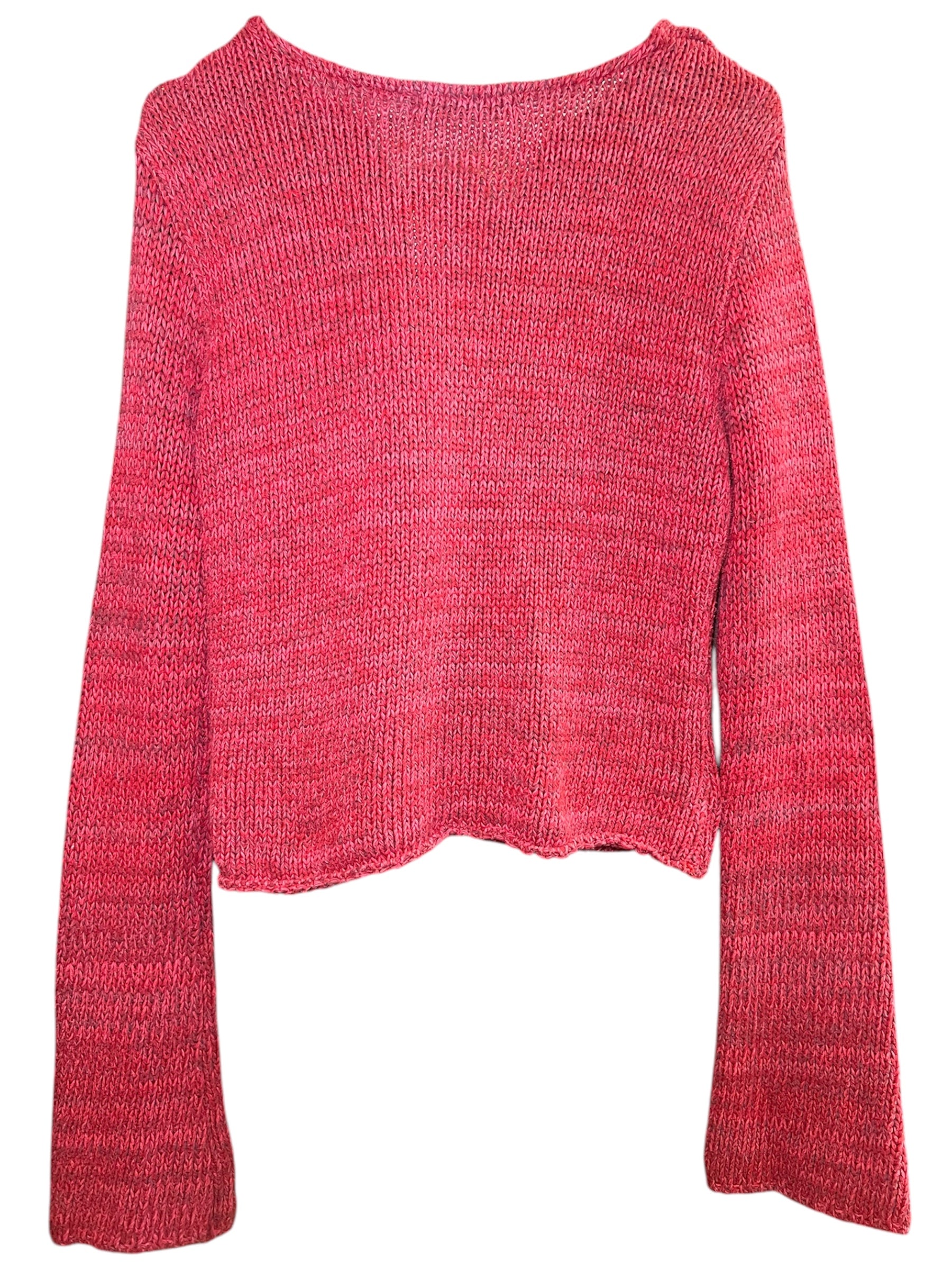 Pull court des années 2000, avec motif de fleur. A retrouver chez Canaille Vintage, friperie à Bordeaux