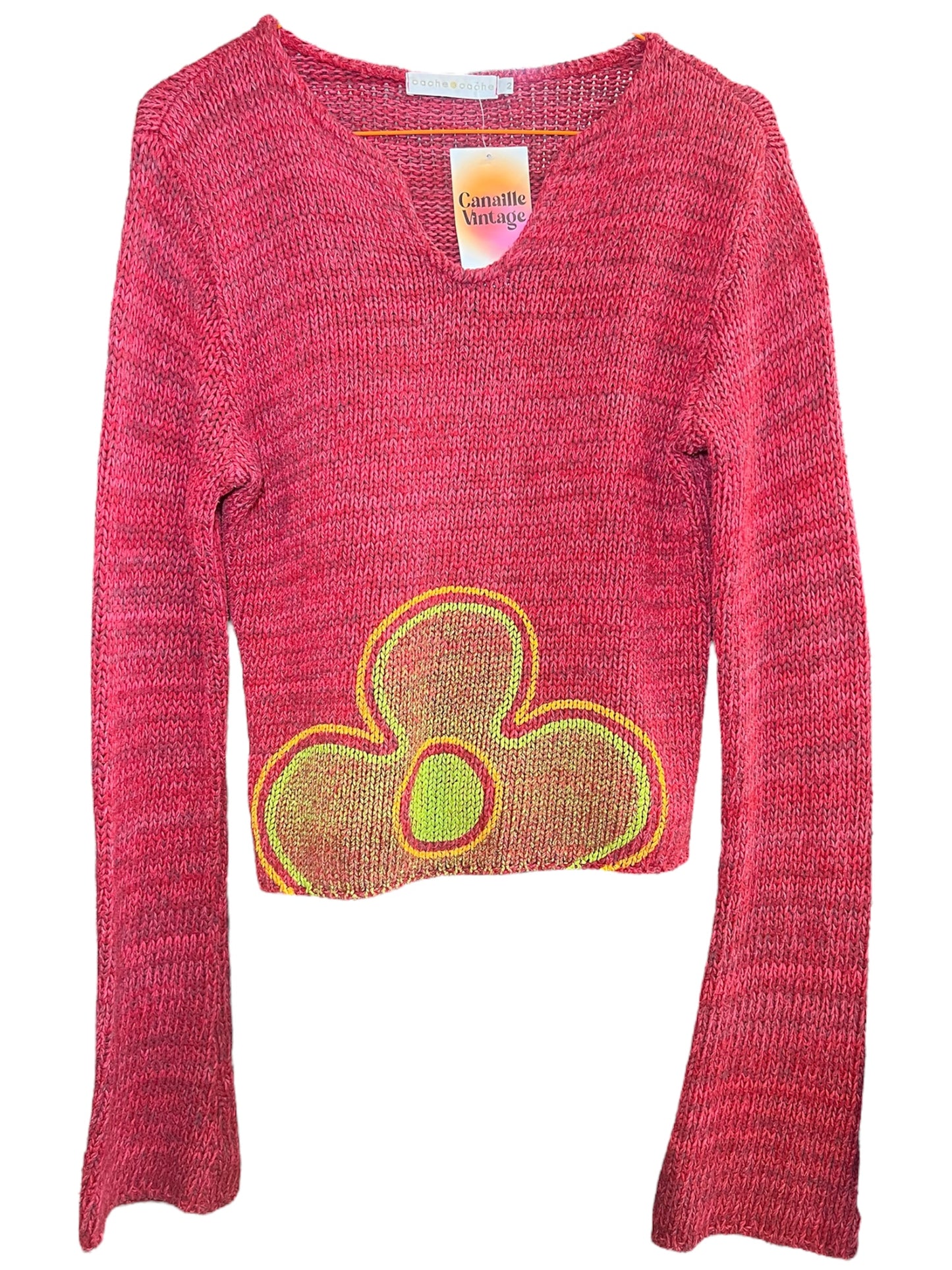 Pull court des années 2000, avec motif de fleur. A retrouver chez Canaille Vintage, friperie à Bordeaux