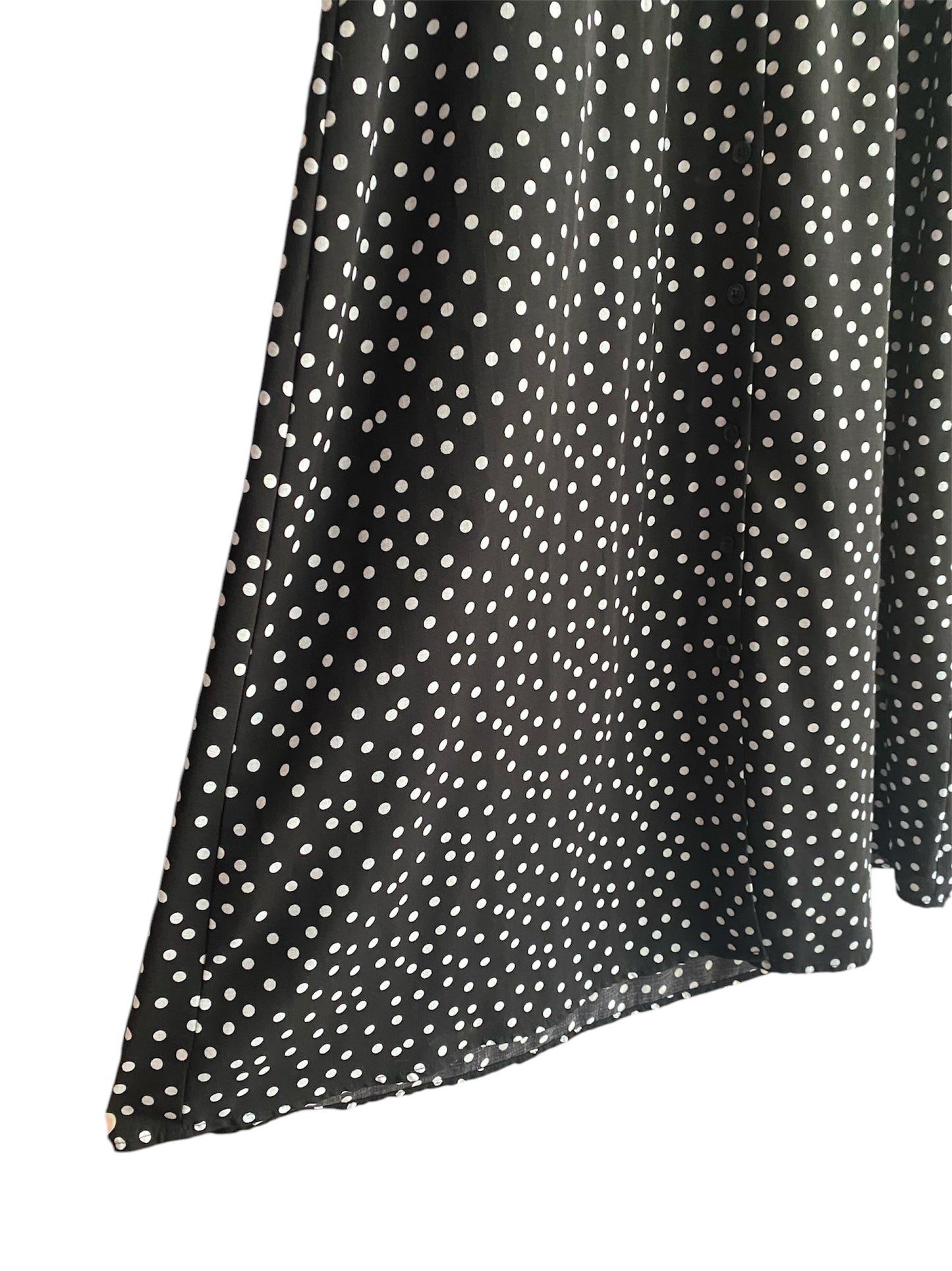 Robe noire à pois blanc de seconde main, vintage. Taille 36/38. Canaille Vintage - Friperie Bordeaux.