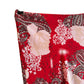 Jupe Y2K rouge à motifs, en mesh. A retrouver chez Canaille Vintage, friperie à bordeaux.