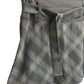 Jupe courte tartan avec une ceinture intégrée. La jupe est à retrouver sur notre boutique en ligne ou dans notre friperie située dans le centre-ville de Bordeaux.